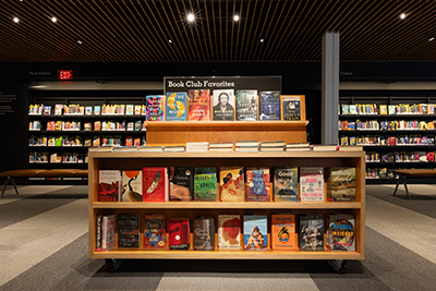 Wide shot of a library and bookcases full of books