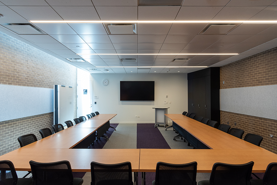 Cosmos Room interior showing tables and chairs with a U-shape setup