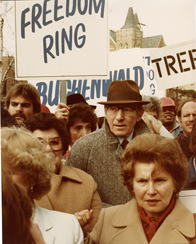 Crowd of people in front of protest signs