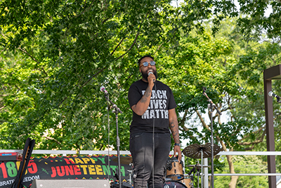 Man singing at Juneteenth celebration