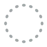 Chairs arranged in a circle with a table at the back.